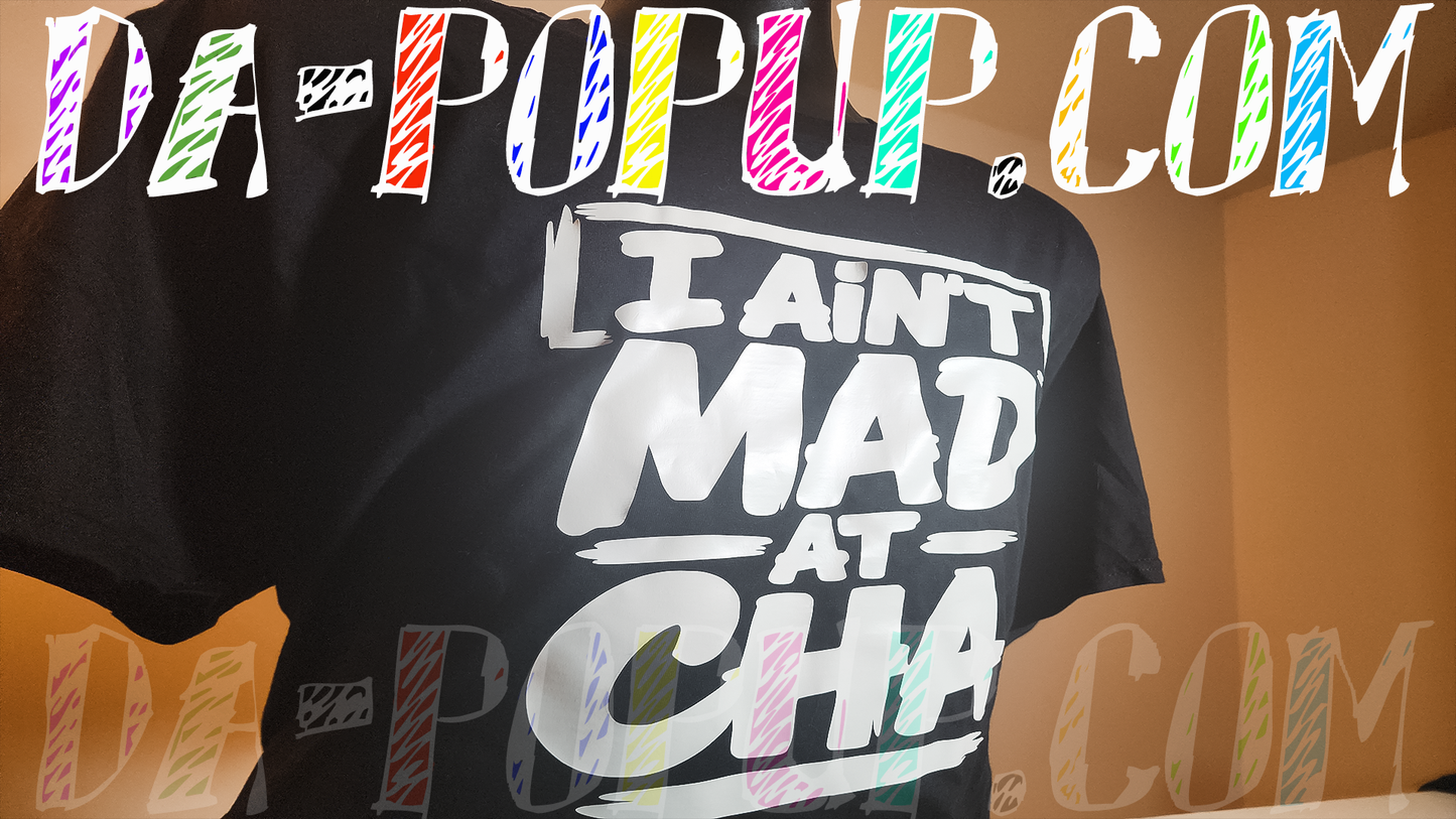 Black graphic t-shirt featuring large white “I Ain’t Mad At Cha” lettering in a bold hip hop inspired design.