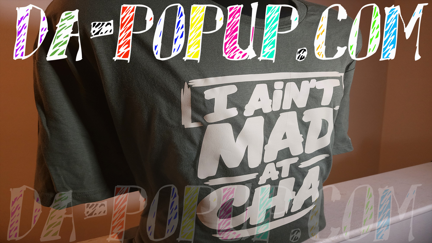 military green  graphic t-shirt featuring large off-white “I Ain’t Mad At Cha” lettering in a bold hip hop inspired design.