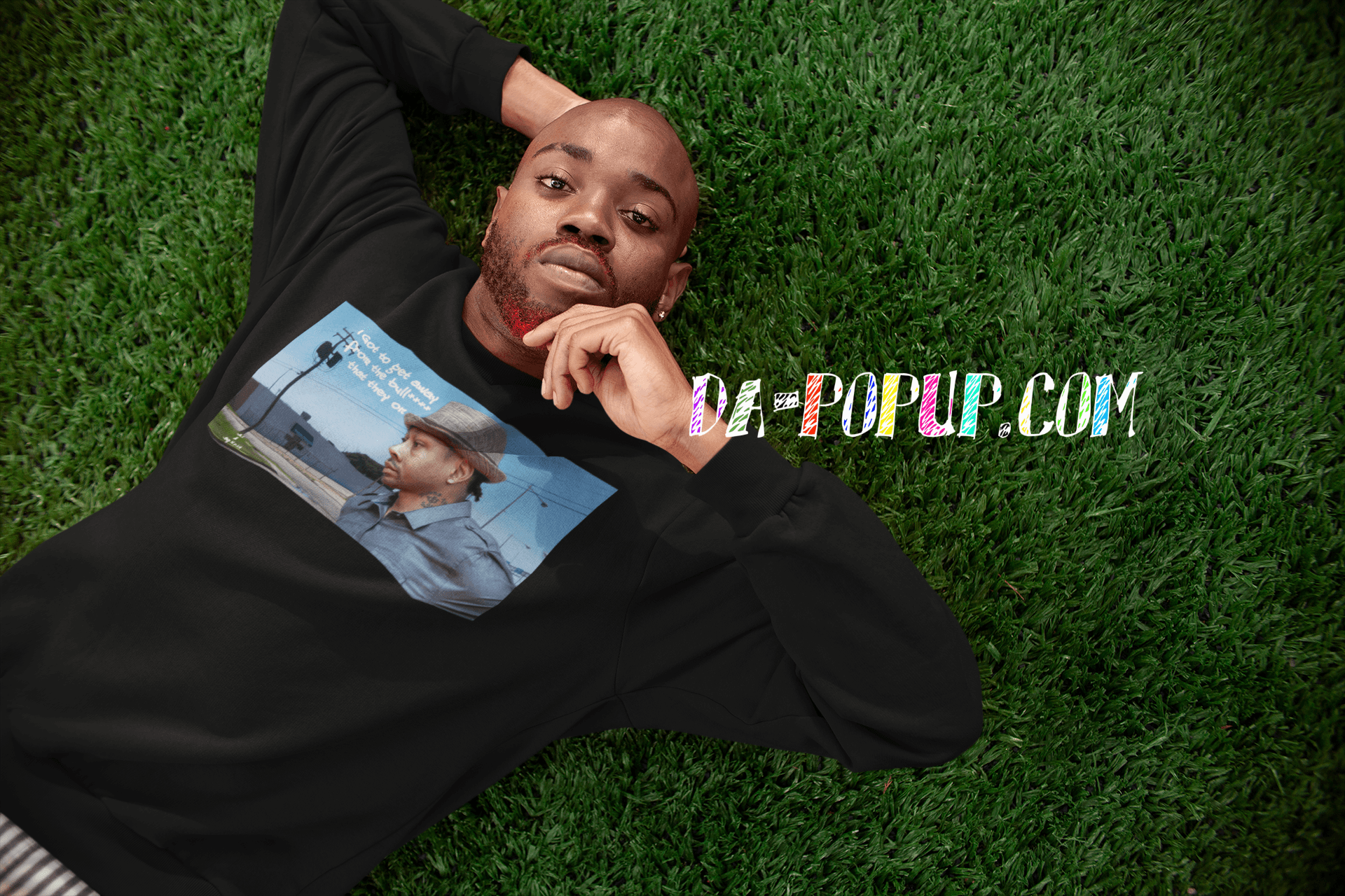 I gotta get away- lyric from southern artist Big K.R.I.T. art inspired a moment of Allen Iverson in deep though. background i well landmark in Newport news,VA called peddlers village red bread bald head diamond earrings well maintained grass male model